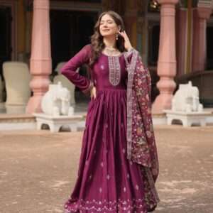 Made from premium Chinon fabric adorned with intricately embroidered sequins, this gown exudes a high-end appeal.
